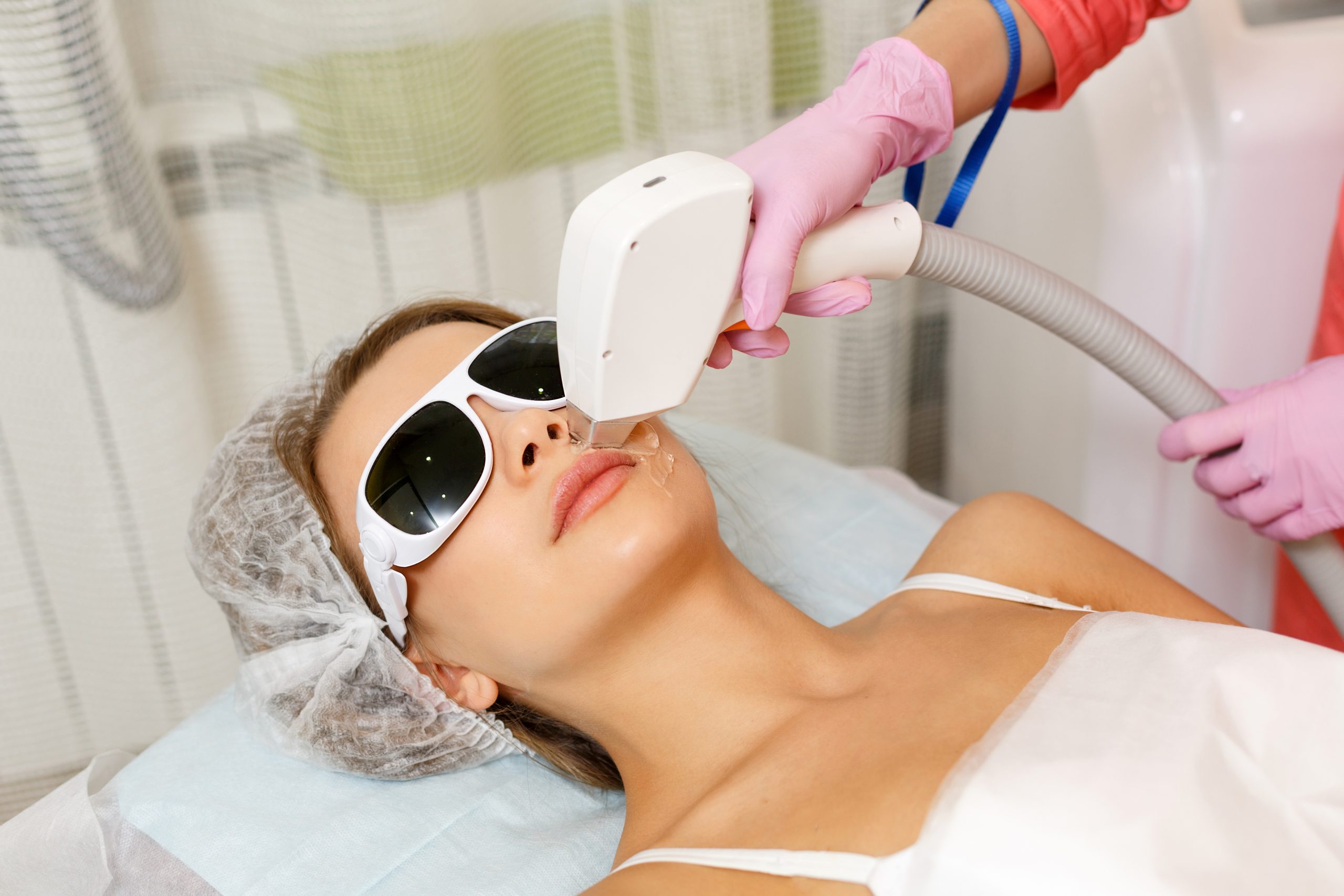 Laser,Hair,Removal,On,The,Face,Of,A,Young,Girl.